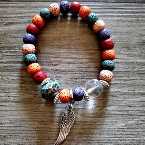 Bohemian Beaded Feather Charmed Bracelet